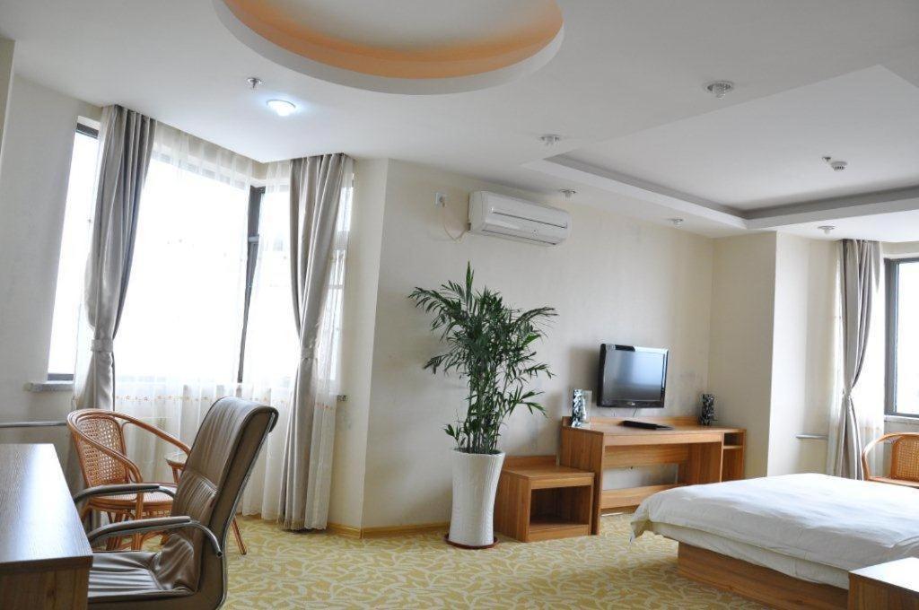 Super 8 Hotel Qingdao Railway Station Gui Zhou Road Oda fotoğraf